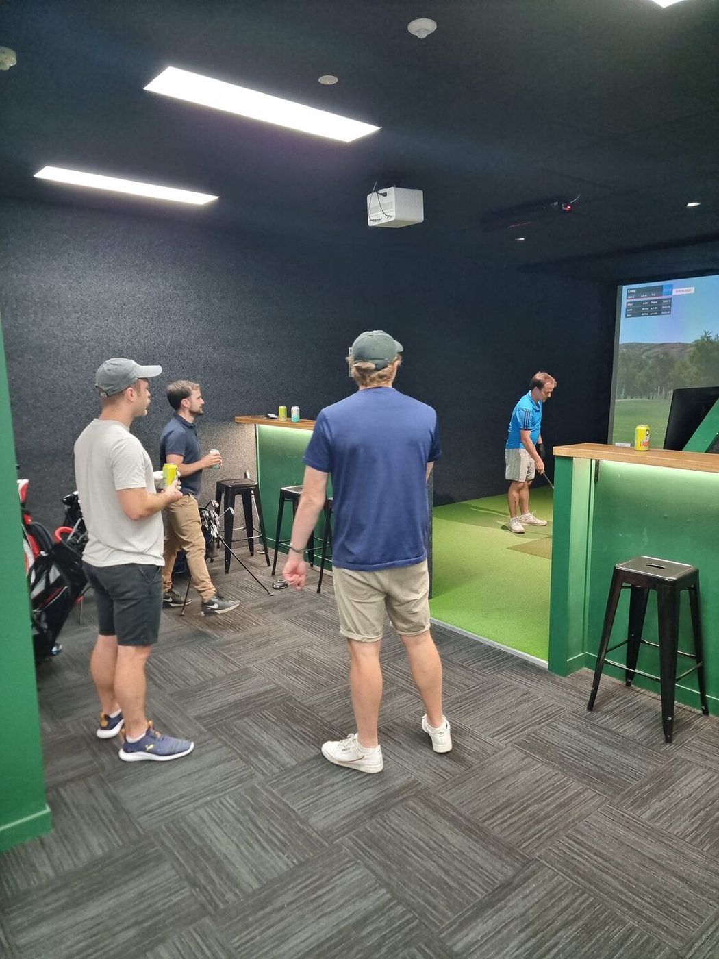 A group celebrating at The Sim Range bar